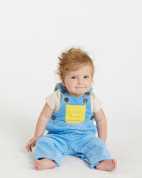 Mary is 9 months old and wearing size 1T